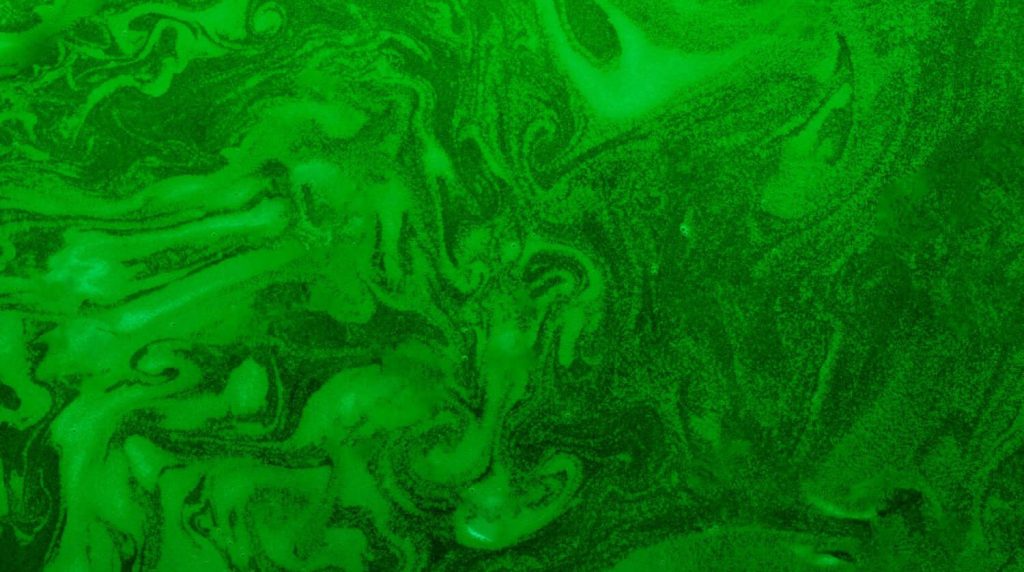 Swirling patterns of vibrant green color.